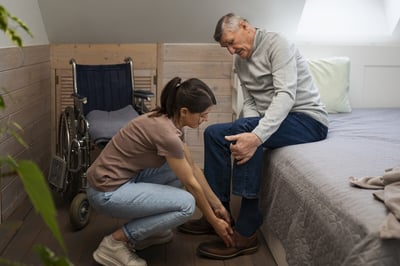 elderly-person-being-taken-care-by-female-caretaker