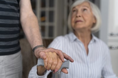 elderly-woman-looking-her-caregiver