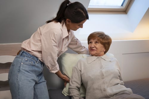 female-nurse-taking-care-elderly-person-1