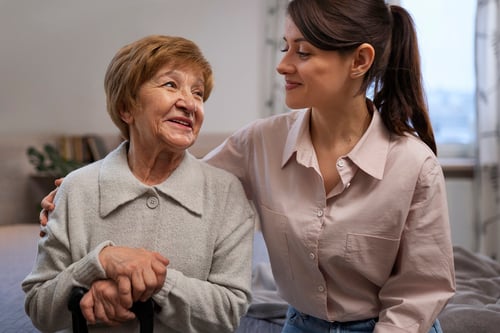 female-nurse-taking-care-elderly-person