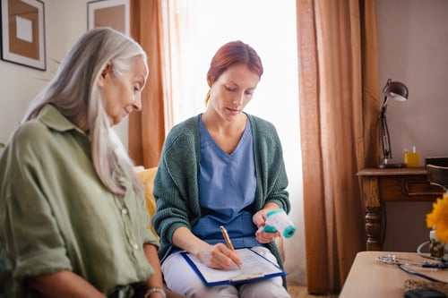 nurse-cosulting-with-senior-her-health-condition (1)