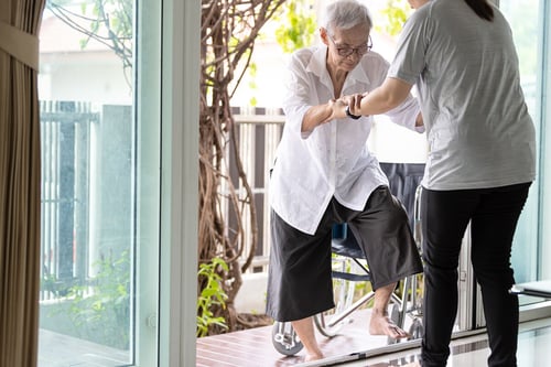 people-standing-table-by-window